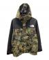 THE NORTH FACE（ザ ノース フェイス）の古着「ノベルティマウンテンライトジャケット」｜オリーブ
