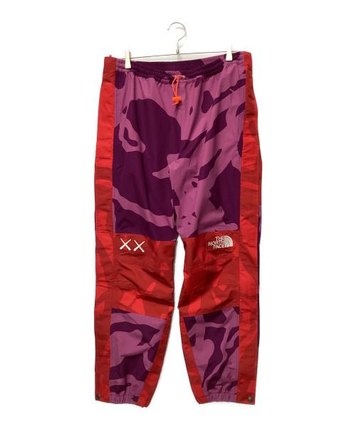 THE NORTH FACE（ザ ノース フェイス）THE NORTH FACE (ザ ノース フェイス) KAWS (カウズ) トラックパンツ ピンク×パープル サイズ:Lの古着・服飾アイテム