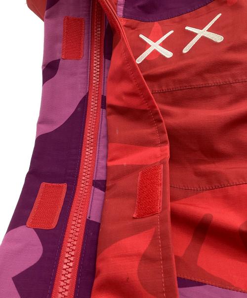 THE NORTH FACE（ザ ノース フェイス）THE NORTH FACE (ザ ノース フェイス) KAWS (カウズ) トラックパンツ ピンク×パープル サイズ:Lの古着・服飾アイテム