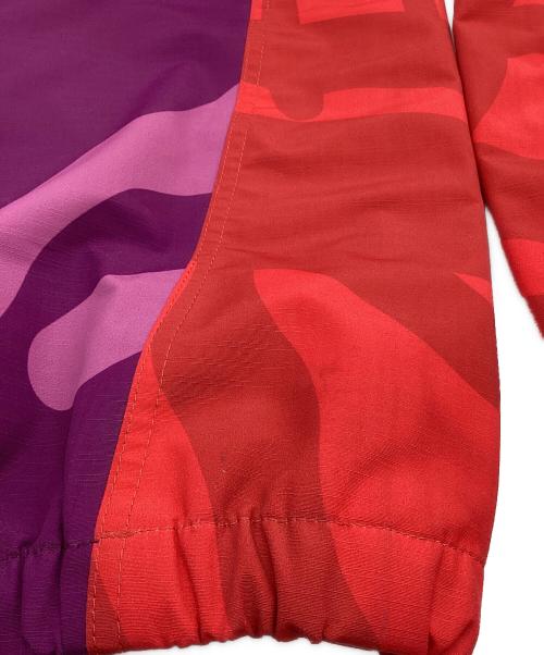 THE NORTH FACE（ザ ノース フェイス）THE NORTH FACE (ザ ノース フェイス) KAWS (カウズ) トラックパンツ ピンク×パープル サイズ:Lの古着・服飾アイテム