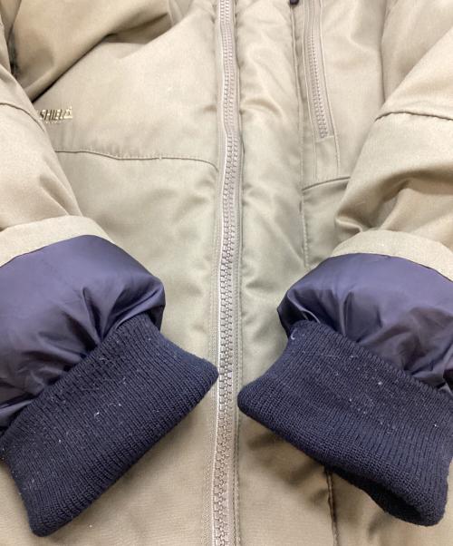GRIP SWANY（グリップスワニー）GRIP SWANY (グリップスワニー) ファイアープルーフダウンジャケット オリーブ サイズ:SIZE Mの古着・服飾アイテム
