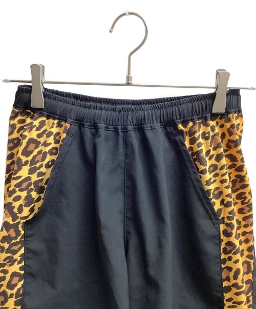 MIOUNTAIN MARTIAL ARTS（マウンテンマーシャルアーツ）MIOUNTAIN MARTIAL ARTS (マウンテンマーシャルアーツ) MMAサイドグラフィックランショーツ（トレッキングボトム) ブラックxオレンジ サイズ:Sの古着・服飾アイテム