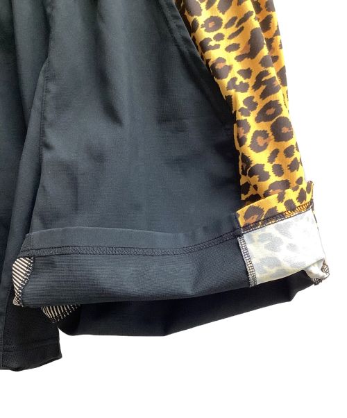 MIOUNTAIN MARTIAL ARTS（マウンテンマーシャルアーツ）MIOUNTAIN MARTIAL ARTS (マウンテンマーシャルアーツ) MMAサイドグラフィックランショーツ（トレッキングボトム) ブラックxオレンジ サイズ:Sの古着・服飾アイテム