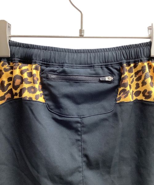 MIOUNTAIN MARTIAL ARTS（マウンテンマーシャルアーツ）MIOUNTAIN MARTIAL ARTS (マウンテンマーシャルアーツ) MMAサイドグラフィックランショーツ（トレッキングボトム) ブラックxオレンジ サイズ:Sの古着・服飾アイテム