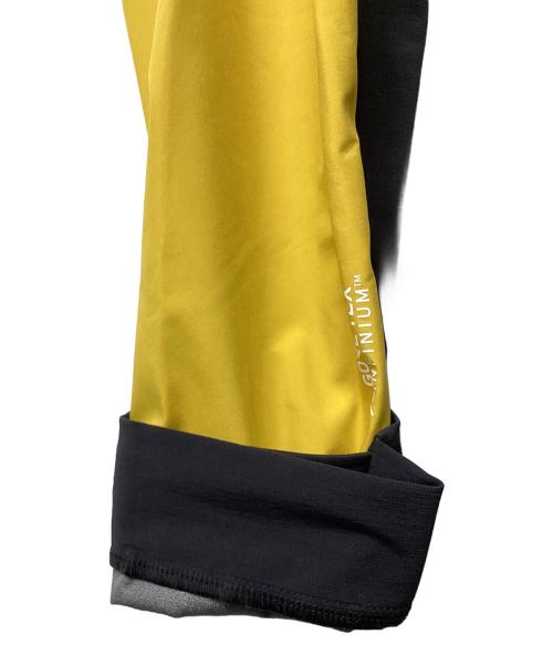 MILLET（ミレー）MILLET (ミレー) トリロジー V アイコン インフィニウム ジャケット(トレッキングウェア/ソフトシェル) ブラック×イエロー サイズ:Sの古着・服飾アイテム