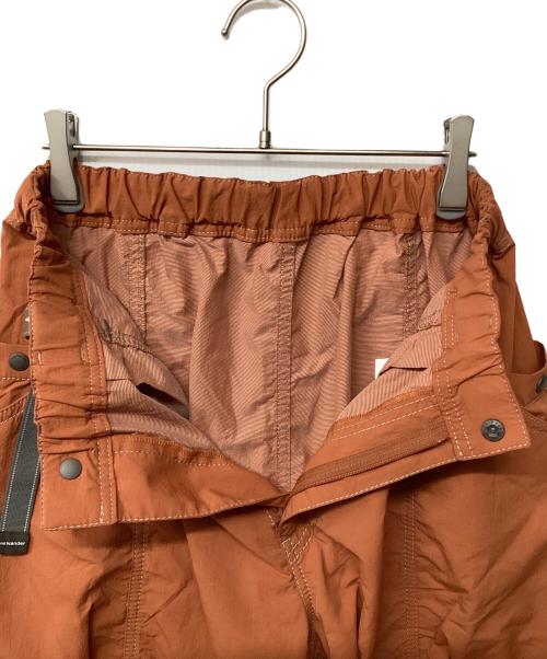 and wander（アンドワンダー）and wander (アンドワンダー) crinkled nylon pants オレンジ サイズ:Sの古着・服飾アイテム