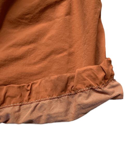and wander（アンドワンダー）and wander (アンドワンダー) crinkled nylon pants オレンジ サイズ:Sの古着・服飾アイテム