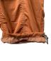 中古・古着 and wander (アンドワンダー) crinkled nylon pants オレンジ サイズ:S：15000円