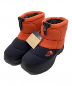 THE NORTH FACEザ ノース フェイス）の古着「ヌプシ ブーティ ショート ポーラテック」｜オレンジ