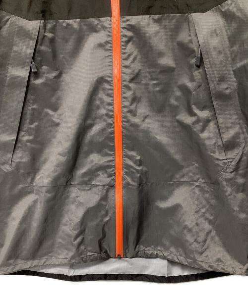 mont-bell（モンベル）mont-bell (モンベル) サンダーパスジャケット(トレッキングウェア/レインウェア) グレー×オレンジ サイズ:Lの古着・服飾アイテム