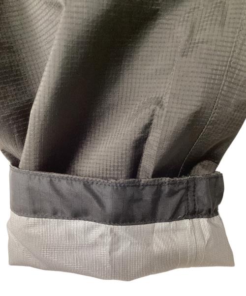 mont-bell（モンベル）mont-bell (モンベル) サンダーパスジャケット(トレッキングウェア/レインウェア) グレー×オレンジ サイズ:Lの古着・服飾アイテム