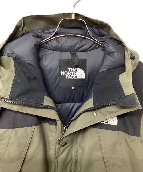 THE NORTH FACE（ザ ノース フェイス）THE NORTH FACE (ザ ノース フェイス) マウンテンダウンジャケット オリーブ サイズ:Mの古着・服飾アイテム