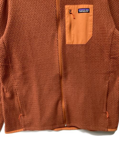 Patagonia（パタゴニア）Patagonia (パタゴニア) R1エア・フルジップ・フーディ（トレッキングウェア) オレンジ サイズ:XLの古着・服飾アイテム