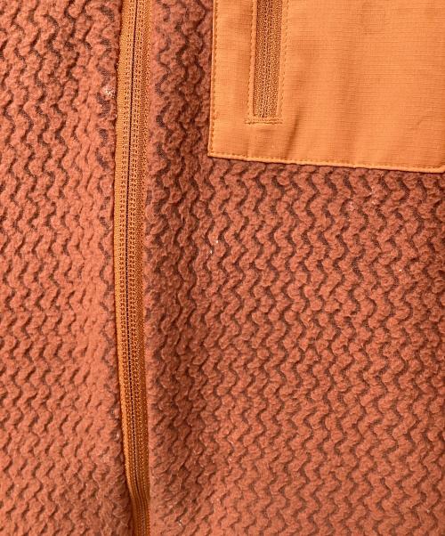 Patagonia（パタゴニア）Patagonia (パタゴニア) R1エア・フルジップ・フーディ（トレッキングウェア) オレンジ サイズ:XLの古着・服飾アイテム