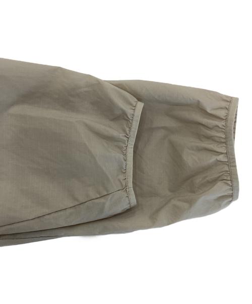 norrona（ノローナ）norrona (ノローナ) Falketind Aero60 Hood ベージュ×オレンジ サイズ:Mの古着・服飾アイテム