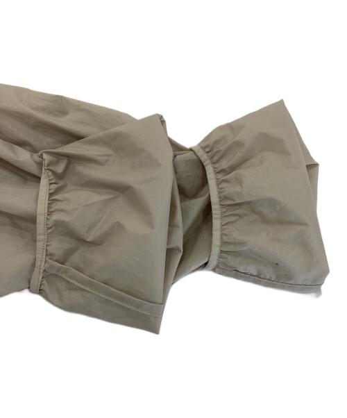 norrona（ノローナ）norrona (ノローナ) Falketind Aero60 Hood ベージュ×オレンジ サイズ:Mの古着・服飾アイテム