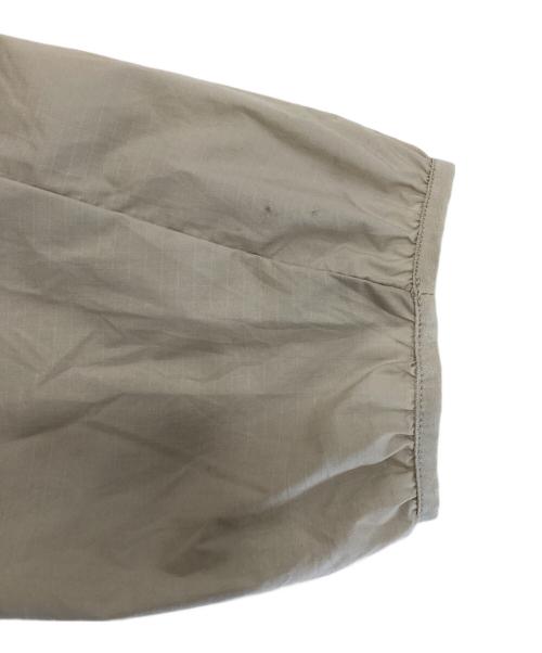 norrona（ノローナ）norrona (ノローナ) Falketind Aero60 Hood ベージュ×オレンジ サイズ:Mの古着・服飾アイテム