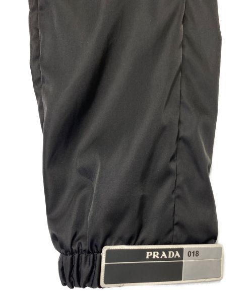 PRADA（プラダ）PRADA (プラダ) ラバーパッチ ナイロンパンツ ブラック サイズ:46の古着・服飾アイテム