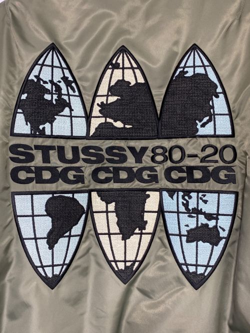 stussy（ステューシー）stussy (ステューシー) COMME des GARCONS (コムデギャルソン) 40th Anniversary CDG MA-1 Jacket カーキ サイズ:XLの古着・服飾アイテム