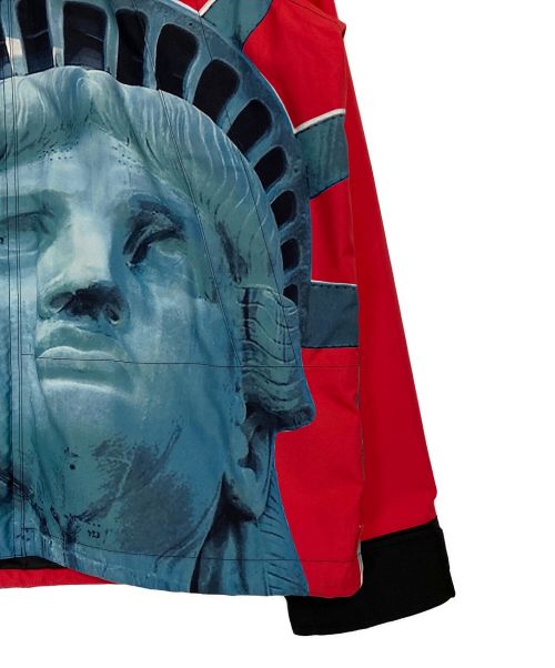 SUPREME（シュプリーム）SUPREME (シュプリーム) THE NORTH FACE (ザ ノース フェイス) Statue of Liberty Mountain Jacket レッド×ブラック サイズ:Mの古着・服飾アイテム