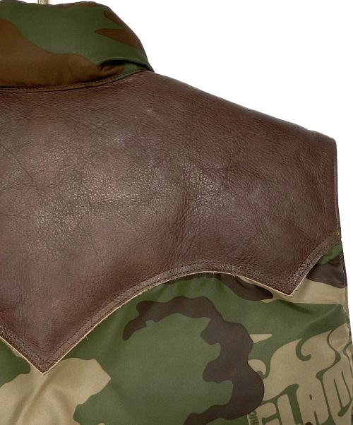 Rocky Mountain FeatherBed（ロッキーマウンテンフェザーベッド）Rocky Mountain FeatherBed (ロッキーマウンテンフェザーベッド) Hysteric Glamour (ヒステリックグラマー) WOODLAND FRAM CAMO柄DOWN VEST カモ サイズ:44の古着・服飾アイテム