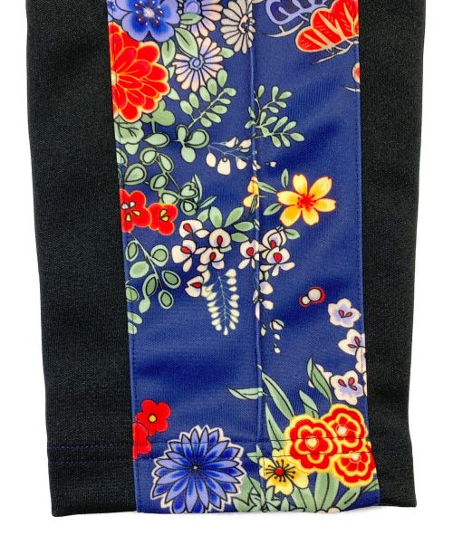 Palm Angels（パーム エンジェルス）Palm Angels (パーム エンジェルス) BLOOMING SLIM TRACK PANTS ブルー サイズ:M 未使用品の古着・服飾アイテム