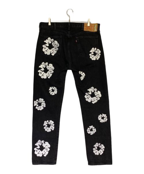 Denim Tears（デニムティアーズ）Denim Tears (デニムティアーズ) LEVI'S (リーバイス) COTTON WREATH CHAINSTITCH ブラック サイズ:38の古着・服飾アイテム