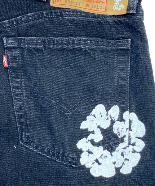 Denim Tears（デニムティアーズ）Denim Tears (デニムティアーズ) LEVI'S (リーバイス) COTTON WREATH CHAINSTITCH ブラック サイズ:38の古着・服飾アイテム