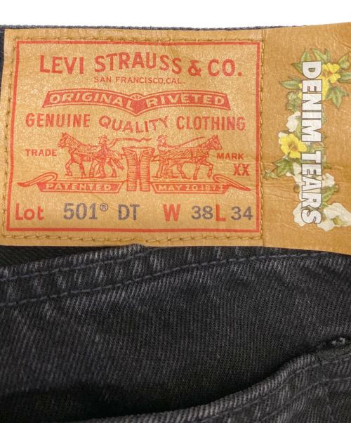 Denim Tears（デニムティアーズ）Denim Tears (デニムティアーズ) LEVI'S (リーバイス) COTTON WREATH CHAINSTITCH ブラック サイズ:38の古着・服飾アイテム
