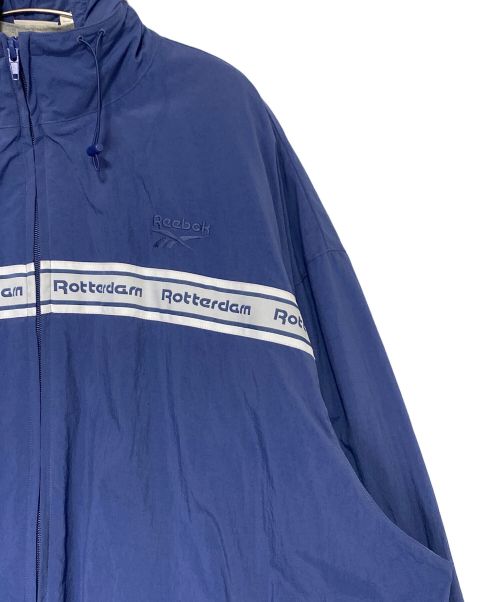 VETEMENTS（ヴェトモン）VETEMENTS (ヴェトモン) REEBOK (リーボック) レイヤードトラックジャケット ブルー サイズ:Sの古着・服飾アイテム
