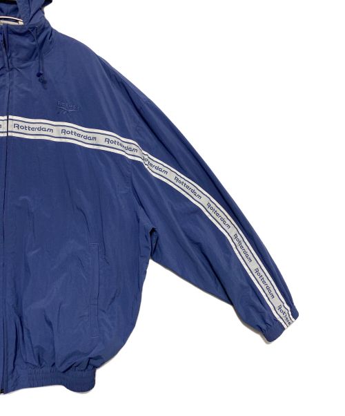 VETEMENTS（ヴェトモン）VETEMENTS (ヴェトモン) REEBOK (リーボック) レイヤードトラックジャケット ブルー サイズ:Sの古着・服飾アイテム