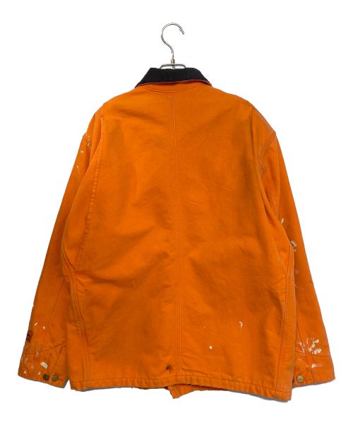 HERON PRESTON（ヘロンプレストン）HERON PRESTON (ヘロンプレストン) Carhartt WIP (カーハート ワークインプログレス) ペイント加工 ワークジャケット オレンジ サイズ:Mの古着・服飾アイテム
