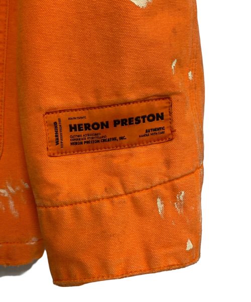 HERON PRESTON（ヘロンプレストン）HERON PRESTON (ヘロンプレストン) Carhartt WIP (カーハート ワークインプログレス) ペイント加工 ワークジャケット オレンジ サイズ:Mの古着・服飾アイテム
