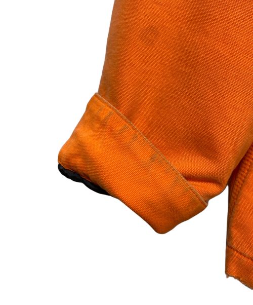 HERON PRESTON（ヘロンプレストン）HERON PRESTON (ヘロンプレストン) Carhartt WIP (カーハート ワークインプログレス) ペイント加工 ワークジャケット オレンジ サイズ:Mの古着・服飾アイテム