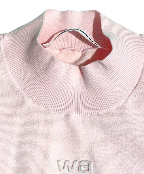 ALEXANDER WANG.T（アレキサンダーワンティー）ALEXANDER WANG.T (アレキサンダーワンティー) エンボスロゴトップス ピンク サイズ:Sの古着・服飾アイテム