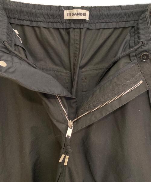 JIL SANDER（ジルサンダー）JIL SANDER (ジルサンダー) ニーレングスプリーツ コットンパンツ ブラック サイズ:46の古着・服飾アイテム