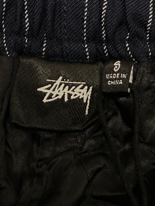 stussy（ステューシー）stussy (ステューシー) BEACH PANT WRINKLED STRIPE ネイビー サイズ:Sの古着・服飾アイテム