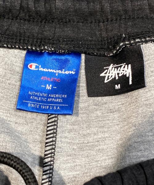 stussy（ステューシー）stussy (ステューシー) Champion (チャンピオン) スウェットパンツ グレー サイズ:Mの古着・服飾アイテム