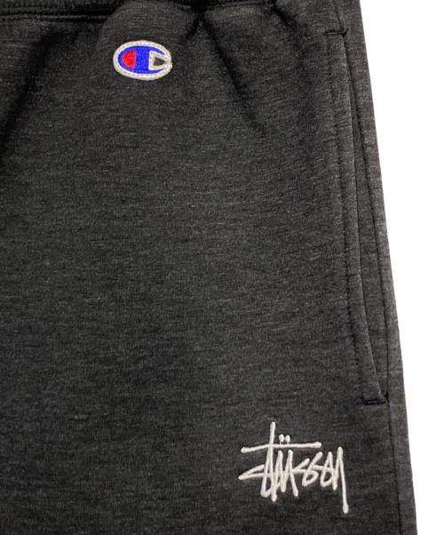 stussy（ステューシー）stussy (ステューシー) Champion (チャンピオン) スウェットパンツ グレー サイズ:Mの古着・服飾アイテム