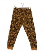 A BATHING APE×MCMア ベイシング エイプ×エムシーエム）の古着「Camo Slim Sweat Pants」｜オレンジ