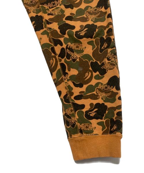 A BATHING APE（ア ベイシング エイプ）A BATHING APE (ア ベイシング エイプ) MCM (エムシーエム) Camo Slim Sweat Pants オレンジ サイズ:Sの古着・服飾アイテム