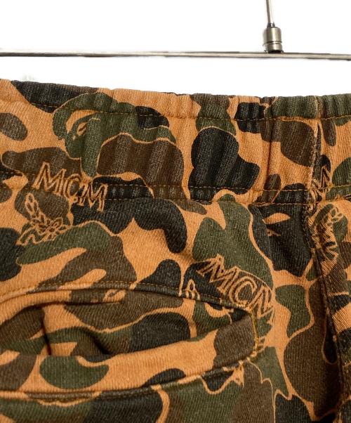 A BATHING APE（ア ベイシング エイプ）A BATHING APE (ア ベイシング エイプ) MCM (エムシーエム) Camo Slim Sweat Pants オレンジ サイズ:Sの古着・服飾アイテム