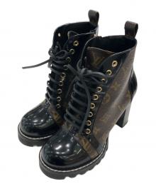 LOUIS VUITTON（ルイ ヴィトン）の古着「スタートレイル アンクルブーツ」｜ブラウン