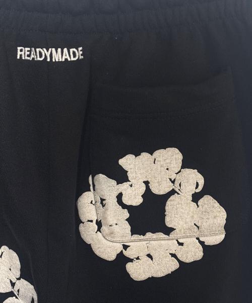 Denim Tears（デニムティアーズ）Denim Tears (デニムティアーズ) READYMADE (レディメイド) COTTON WREATH SWEAT FLARE PANTS ブラック×ホワイト サイズ:Mの古着・服飾アイテム