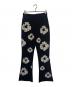 Denim Tears（デニムティアーズ）の古着「COTTON WREATH SWEAT FLARE PANTS」｜ブラック×ホワイト