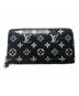 LOUIS VUITTON（ルイ ヴィトン）の古着「エキゾチック レザー ジッピー ウォレット」｜ブラック