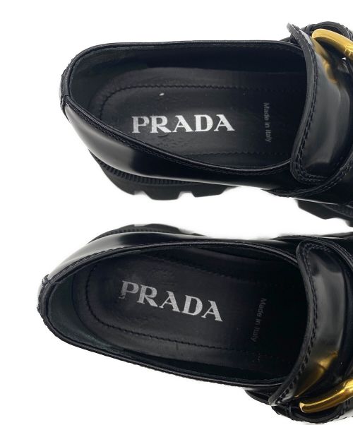 PRADA（プラダ）PRADA (プラダ) バックルベルトプラットフォームローファー ブラック サイズ:36 1/2の古着・服飾アイテム