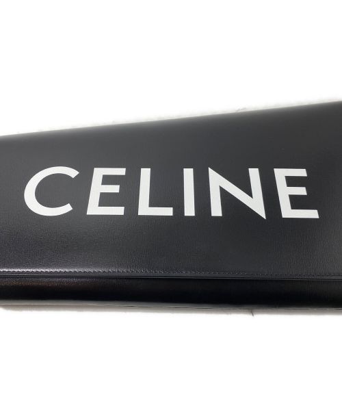 CELINE（セリーヌ）CELINE (セリーヌ) プリント アシンメトリック クラッチバッグ ブラックの古着・服飾アイテム
