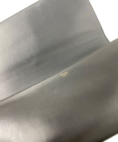 CELINE（セリーヌ）CELINE (セリーヌ) プリント アシンメトリック クラッチバッグ ブラックの古着・服飾アイテム