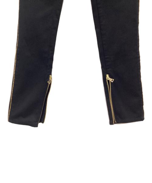 ALEXANDER McQUEEN（アレキサンダーマックイーン）ALEXANDER McQUEEN (アレキサンダーマックイーン) スカルスタッズデニムパンツ ブラック サイズ:38の古着・服飾アイテム
